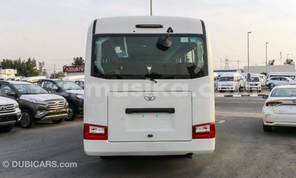 Buy Import Toyota Coaster White Car in Import - Dubai in Harare Buy Import Toyota Coaster White Car in Import - Dubai in Harare