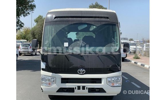Acheter Import Voiture Toyota Coaster Blanc à Import - Dubai, Harare Acheter Import Voiture Toyota Coaster Blanc à Import - Dubai, Harare