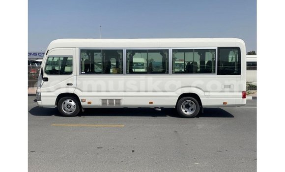 Acheter Import Voiture Toyota Coaster Blanc à Import - Dubai, Harare Acheter Import Voiture Toyota Coaster Blanc à Import - Dubai, Harare