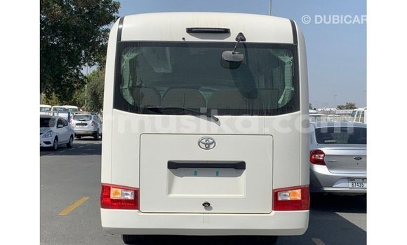 Acheter Import Voiture Toyota Coaster Blanc à Import - Dubai, Harare Acheter Import Voiture Toyota Coaster Blanc à Import - Dubai, Harare