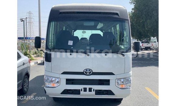 Acheter Import Voiture Toyota Coaster Blanc à Import - Dubai, Harare Acheter Import Voiture Toyota Coaster Blanc à Import - Dubai, Harare