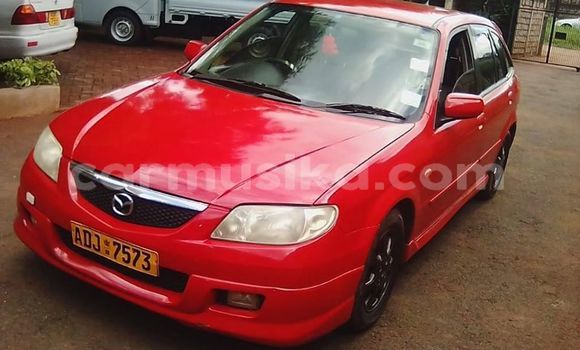 Buy Used Mazda Familia Red Car in Harare in Harare