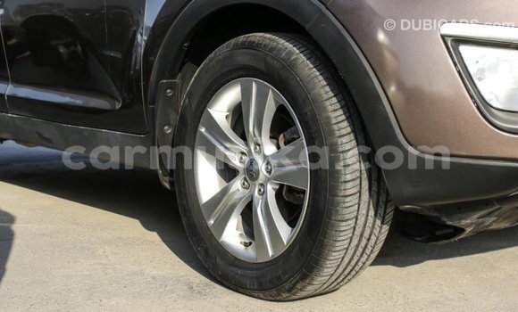 Nunua Imported Kia Sportage Brown Gari ndani ya Import - Dubai nchini Harare