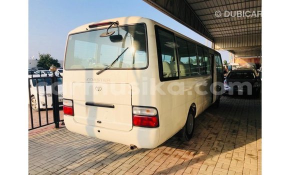 Buy Import Toyota Coaster White Car in Import - Dubai in Harare Buy Import Toyota Coaster White Car in Import - Dubai in Harare