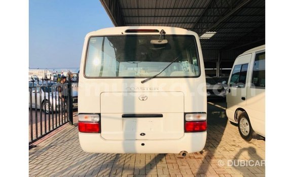 Buy Import Toyota Coaster White Car in Import - Dubai in Harare Buy Import Toyota Coaster White Car in Import - Dubai in Harare