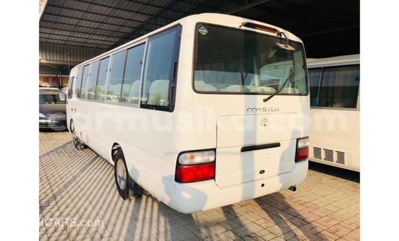 Buy Import Toyota Coaster White Car in Import - Dubai in Harare Buy Import Toyota Coaster White Car in Import - Dubai in Harare