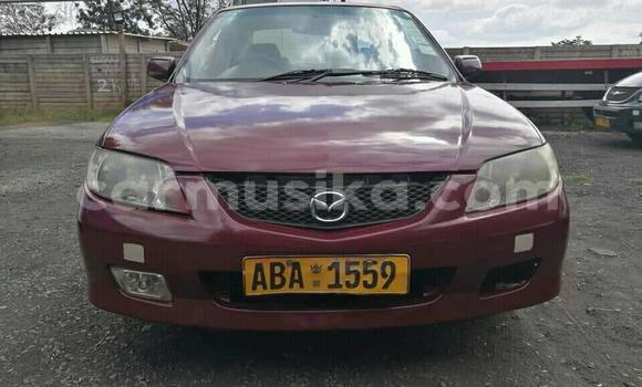 Nunua Ilio tumika Mazda 323 Nyekundu Gari ndani ya Harare nchini Harare Nunua Ilio tumika Mazda 323 Nyekundu Gari ndani ya Harare nchini Harare