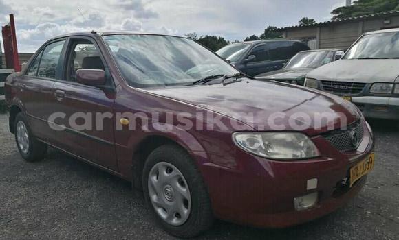 Nunua Ilio tumika Mazda 323 Nyekundu Gari ndani ya Harare nchini Harare Nunua Ilio tumika Mazda 323 Nyekundu Gari ndani ya Harare nchini Harare