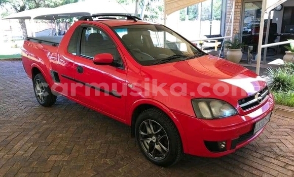Buy Used Opel Corsa Red Car in Beitbridge in Matabeleland South
