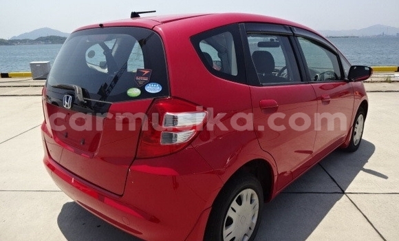 Buy Used Honda Fit Red Car in Beitbridge in Matabeleland South Buy Used Honda Fit Red Car in Beitbridge in Matabeleland South