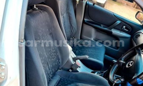 Buy Used Mazda 323 White Car in Beitbridge in Matabeleland South Buy Used Mazda 323 White Car in Beitbridge in Matabeleland South