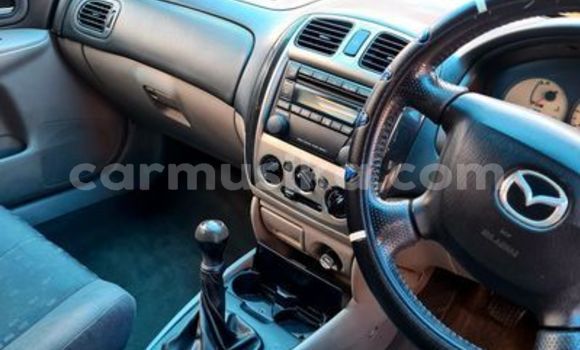 Buy Used Mazda 323 White Car in Beitbridge in Matabeleland South Buy Used Mazda 323 White Car in Beitbridge in Matabeleland South