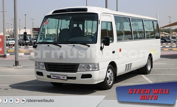 Acheter Import Voiture Toyota Coaster Blanc à Import - Dubai, Harare Acheter Import Voiture Toyota Coaster Blanc à Import - Dubai, Harare