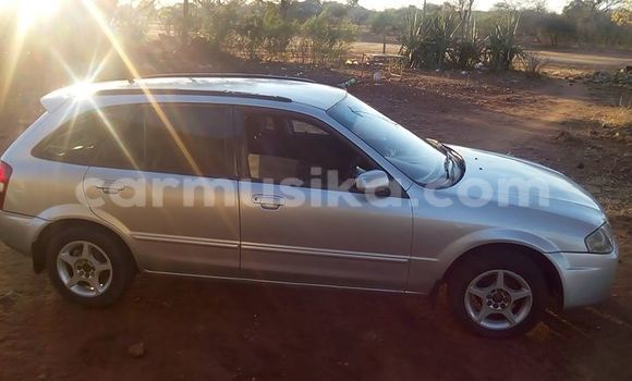 Buy Used Mazda Familia Silver Car in Alexandra Park in Harare Buy Used Mazda Familia Silver Car in Alexandra Park in Harare