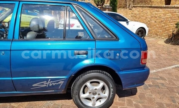 Buy Used Mazda 323 Blue Car in Beitbridge in Matabeleland South Buy Used Mazda 323 Blue Car in Beitbridge in Matabeleland South