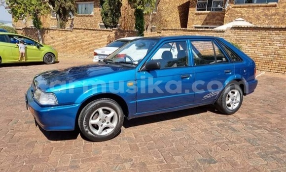 Buy Used Mazda 323 Blue Car in Beitbridge in Matabeleland South Buy Used Mazda 323 Blue Car in Beitbridge in Matabeleland South