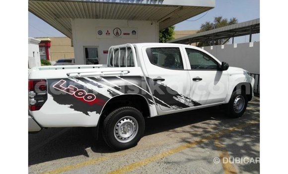 Buy Import Mitsubishi L200 White Car in Import - Dubai in Harare Buy Import Mitsubishi L200 White Car in Import - Dubai in Harare