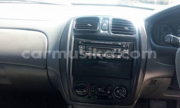 Buy Used Mazda Familia Blue Car in Alexandra Park in Harare Buy Used Mazda Familia Blue Car in Alexandra Park in Harare
