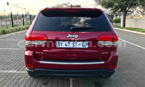 Acheter Occasion Voiture Jeep Grand Cherokee SRT8 Rouge à Beitbridge, Matabeleland South Acheter Occasion Voiture Jeep Grand Cherokee SRT8 Rouge à Beitbridge, Matabeleland South