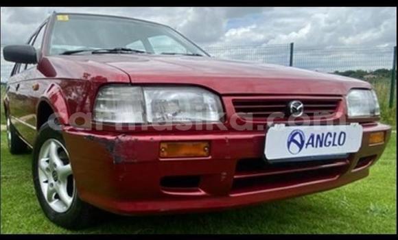 Buy Used Mazda 323 Red Car in Beitbridge in Matabeleland South Buy Used Mazda 323 Red Car in Beitbridge in Matabeleland South