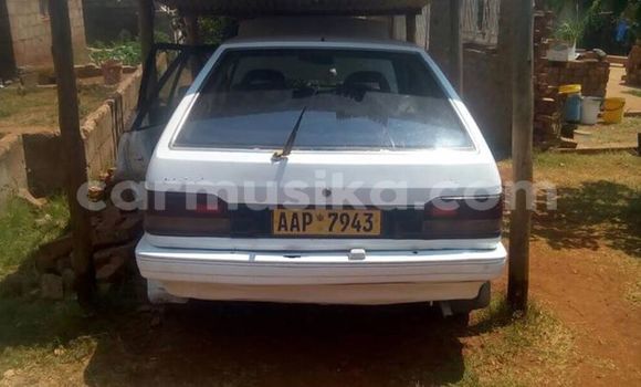 Buy Used Mazda 323 White Car in Alexandra Park in Harare Buy Used Mazda 323 White Car in Alexandra Park in Harare