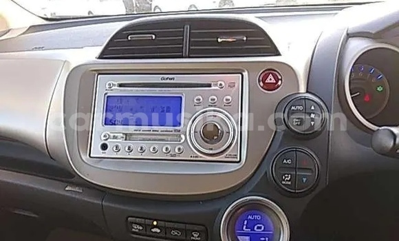 Buy Import Honda Fit Red Car in Beitbridge in Matabeleland South Buy Import Honda Fit Red Car in Beitbridge in Matabeleland South