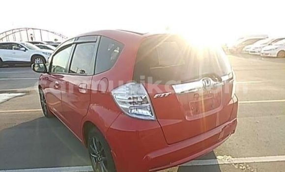 Buy Import Honda Fit Red Car in Beitbridge in Matabeleland South Buy Import Honda Fit Red Car in Beitbridge in Matabeleland South