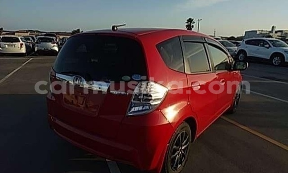 Buy Import Honda Fit Red Car in Beitbridge in Matabeleland South Buy Import Honda Fit Red Car in Beitbridge in Matabeleland South