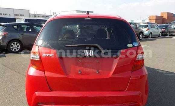 Buy Import Honda Fit Red Car in Beitbridge in Matabeleland South Buy Import Honda Fit Red Car in Beitbridge in Matabeleland South