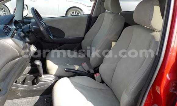 Buy Import Honda Fit Red Car in Beitbridge in Matabeleland South Buy Import Honda Fit Red Car in Beitbridge in Matabeleland South