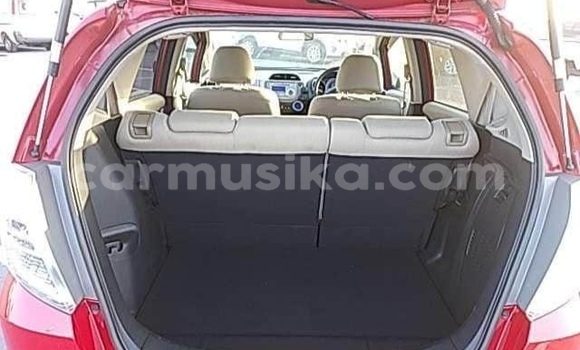 Buy Import Honda Fit Red Car in Beitbridge in Matabeleland South Buy Import Honda Fit Red Car in Beitbridge in Matabeleland South