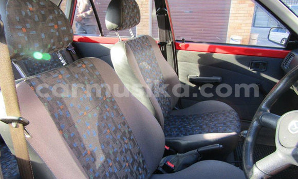 Buy Used Mazda 323 Red Car in Beitbridge in Matabeleland South Buy Used Mazda 323 Red Car in Beitbridge in Matabeleland South