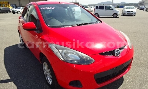 Buy Used Mazda Demio Red Car in Beitbridge in Matabeleland South Buy Used Mazda Demio Red Car in Beitbridge in Matabeleland South