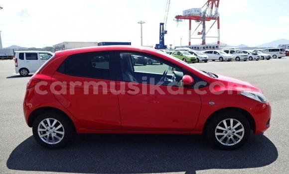 Buy Used Mazda Demio Red Car in Beitbridge in Matabeleland South Buy Used Mazda Demio Red Car in Beitbridge in Matabeleland South
