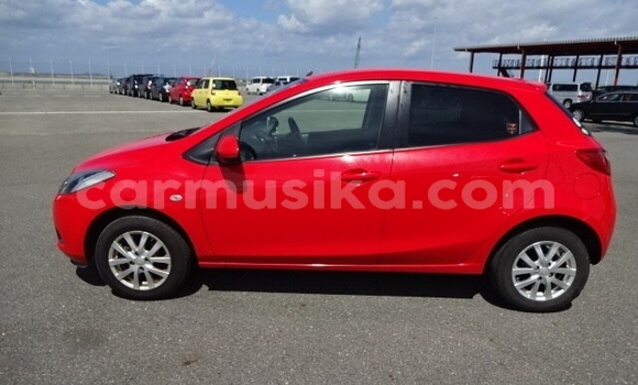 Buy Used Mazda Demio Red Car in Beitbridge in Matabeleland South Buy Used Mazda Demio Red Car in Beitbridge in Matabeleland South