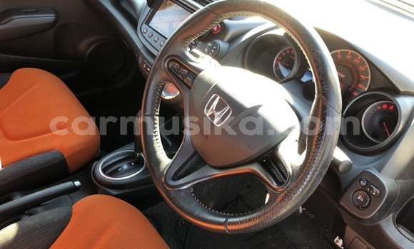 Buy Used Honda Fit Red Car in Beitbridge in Matabeleland South Buy Used Honda Fit Red Car in Beitbridge in Matabeleland South