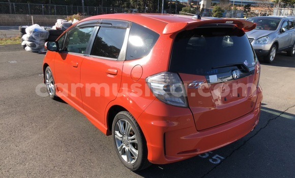 Buy Used Honda Fit Red Car in Beitbridge in Matabeleland South Buy Used Honda Fit Red Car in Beitbridge in Matabeleland South