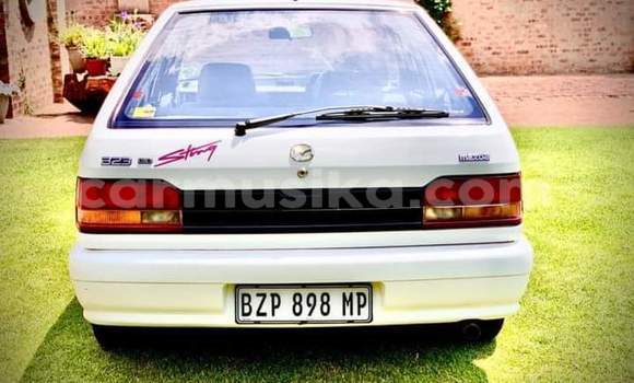 Buy Used Mazda 323 White Car in Beitbridge in Matabeleland South Buy Used Mazda 323 White Car in Beitbridge in Matabeleland South