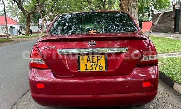 Nunua Ilio tumika Nissan Tiida Nyekundu Gari ndani ya Harare nchini Harare Nunua Ilio tumika Nissan Tiida Nyekundu Gari ndani ya Harare nchini Harare