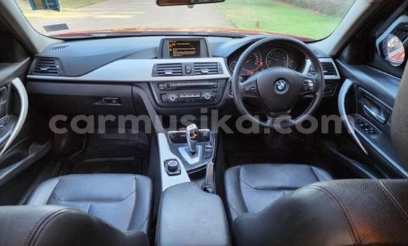 Nunua Ilio tumika BMW 3200 Nyekundu Gari ndani ya Bindura nchini Mashonaland Central