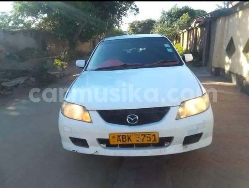 Big with watermark mazda familia harare harare 37086