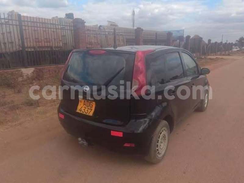 Big with watermark kia carens harare harare 37122