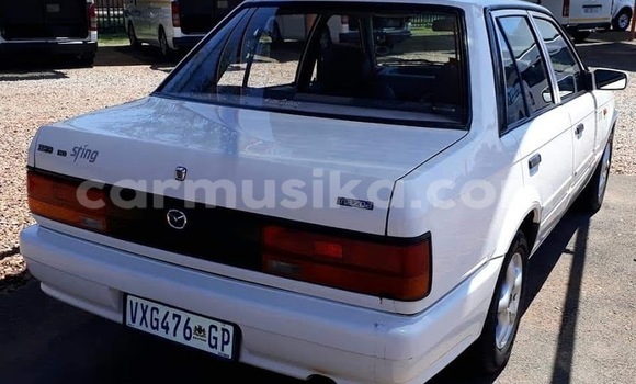 Acheter Occasion Voiture Mazda 323 Blanc à Beitbridge, Matabeleland South Acheter Occasion Voiture Mazda 323 Blanc à Beitbridge, Matabeleland South