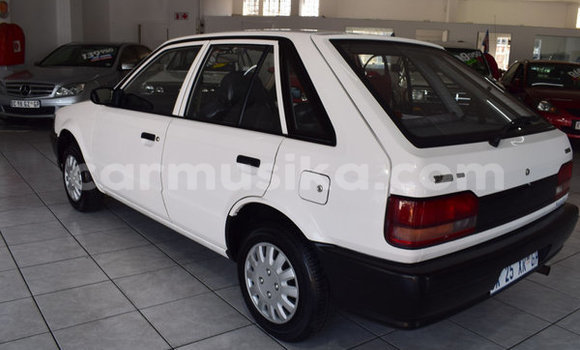 Buy Used Mazda 323 White Car in Beitbridge in Matabeleland South Buy Used Mazda 323 White Car in Beitbridge in Matabeleland South