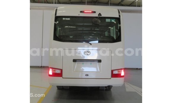 Acheter Import Voiture Toyota Coaster Blanc à Import - Dubai, Harare Acheter Import Voiture Toyota Coaster Blanc à Import - Dubai, Harare