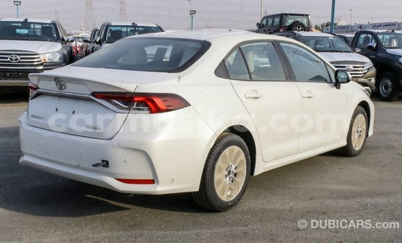 Buy Import Toyota Corolla White Car in Import - Dubai in Harare Buy Import Toyota Corolla White Car in Import - Dubai in Harare