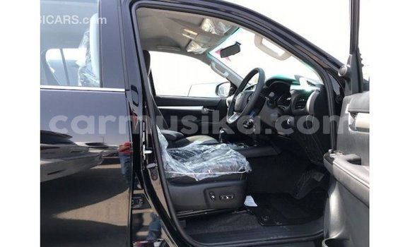 Nunua Imported Toyota Hilux Nyeusi Gari ndani ya Import - Dubai nchini Harare Nunua Imported Toyota Hilux Nyeusi Gari ndani ya Import - Dubai nchini Harare
